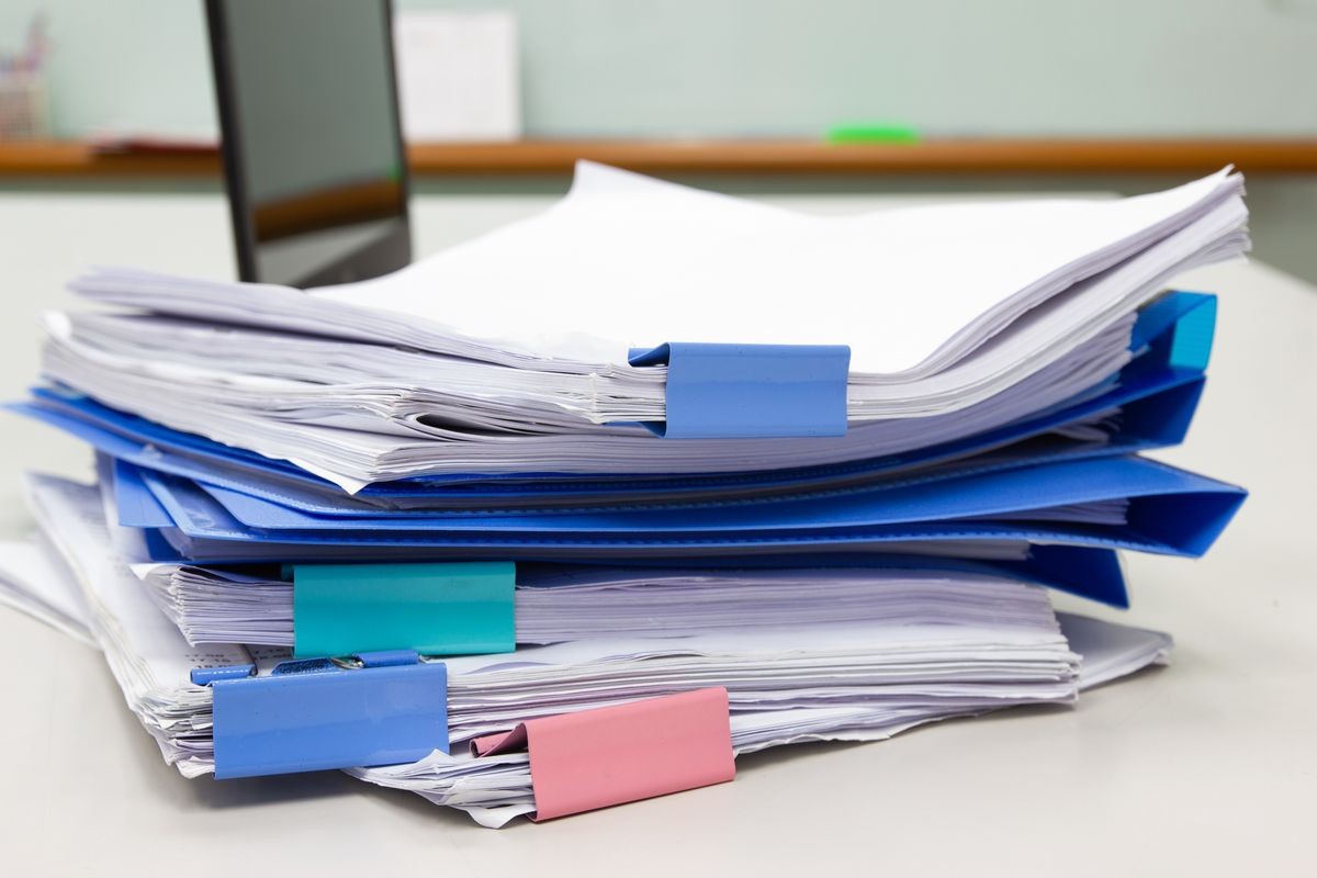 file folder and Stack of business report paper file on the table in a work office, concept document in work office